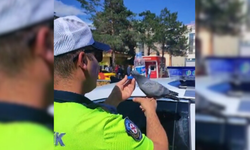 Trafik polisinden güvercine merhamet eli