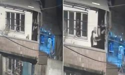 Film sahnesi gibi! Balkondan balkona çatıştılar