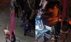 Damda mahsur kalan inek vinçle kurtarıldı