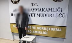 Sürücü kursu sınavına kopya düzeneğiyle girmeye çalıştı